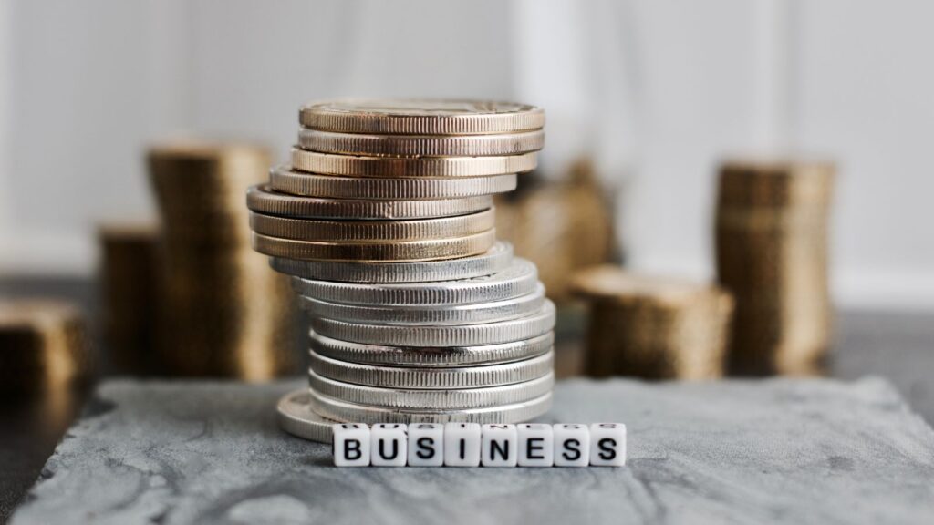 Business money illustrated using coins and the word "business"