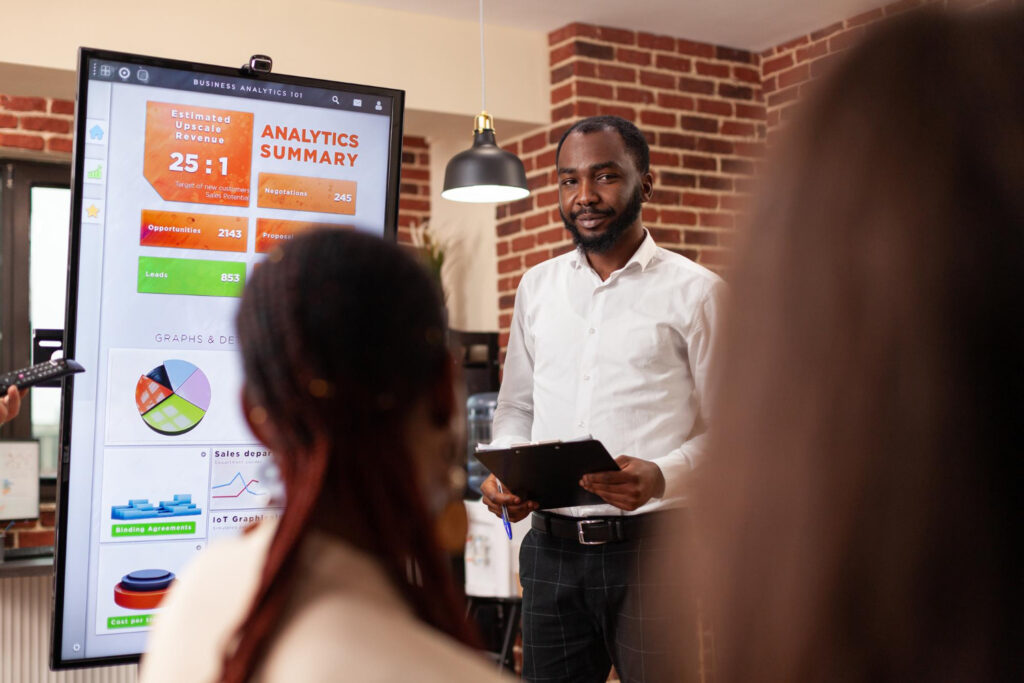 Businesspeople analyzing financial graph