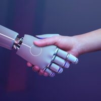 Jasper AI for Business- robot handshake with a robot